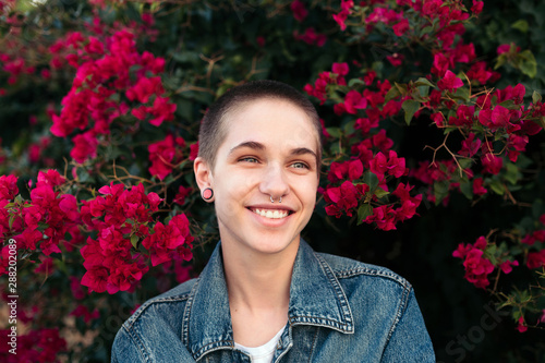 Young androgyne woman with short hair