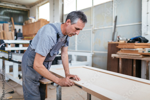Carpenter working in a workshop