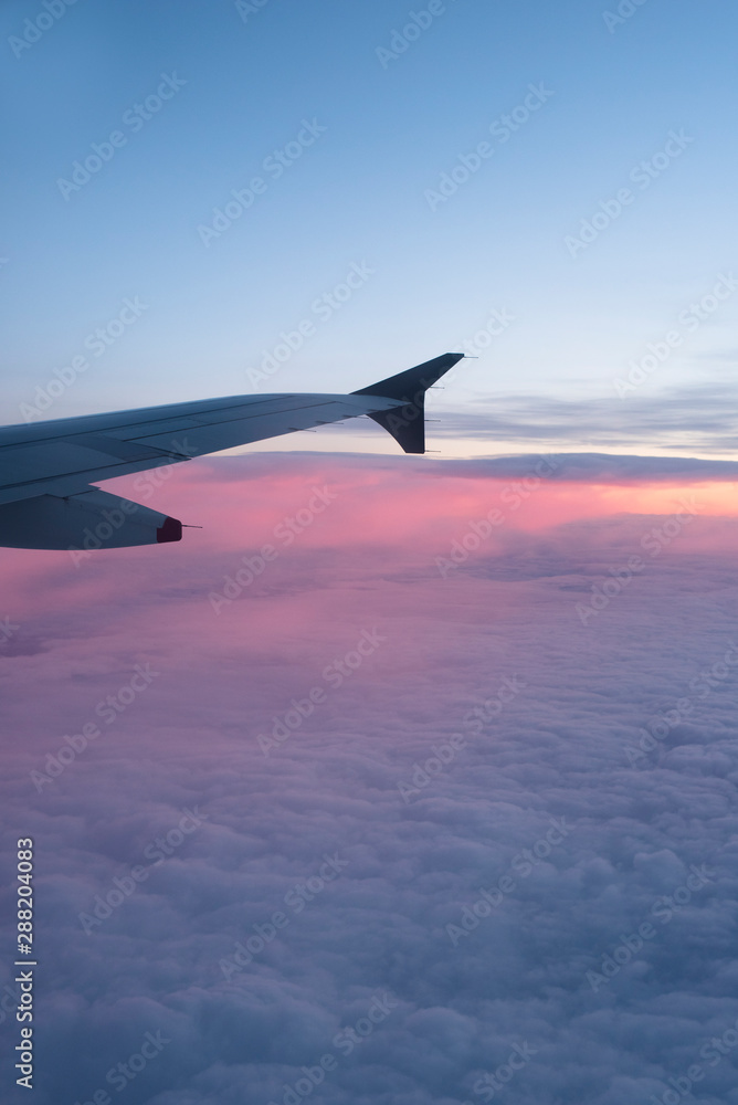 Sunrise, cloud and airplane wing. Sunrise, cloud and airplane wing.