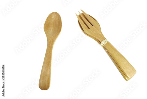 Wooden cutlery on a white background