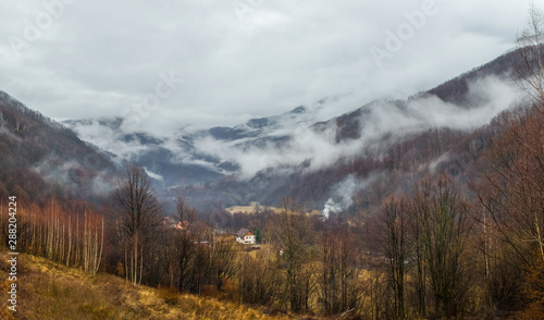 Foggy mountain landscape in Retezat National Park, Carpathian Mountains, Romania