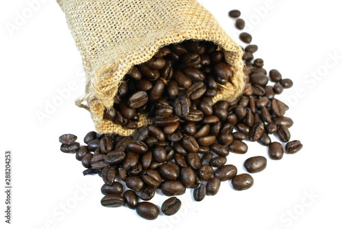 Coffee beans in a sack bag on a white background