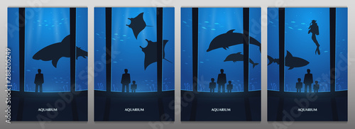Big Aquarium, Oceanarium or Dolphinarium With dolphin, shark and crampfish. People with children watching the underwater world.