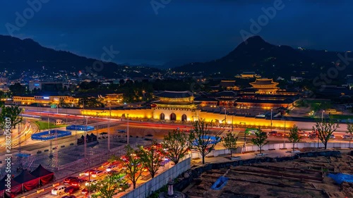 Wallpaper Mural Time lapse 4k,Gwanghwamun gate of Gyeongbokgung palace at night in Seoul,with the name of the palace 'Gyeongbokgung' on a sign Torontodigital.ca
