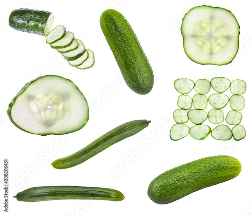 various sliced and whole raw cucumbers isolated