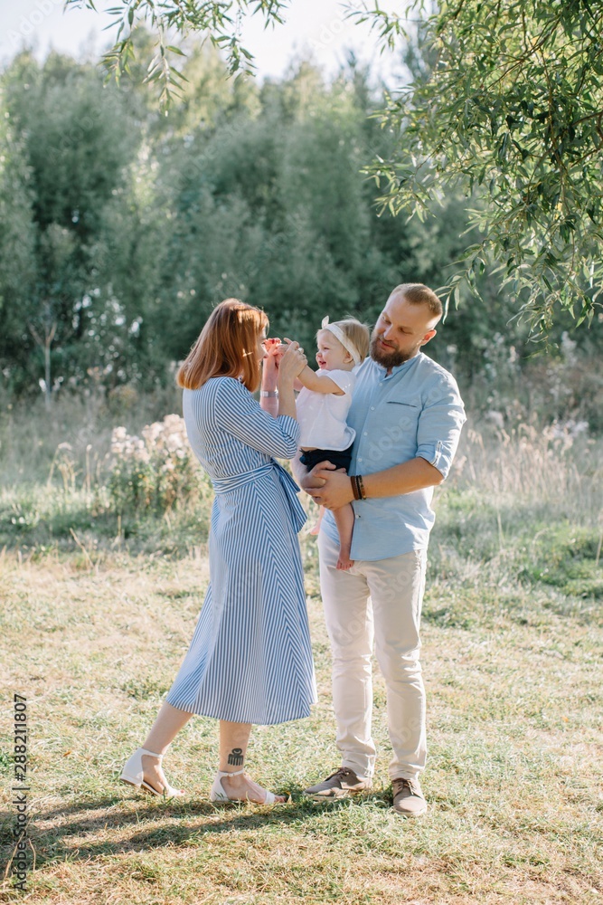 Cheerful family spending time together at nature Cheerful family spending time together at nature