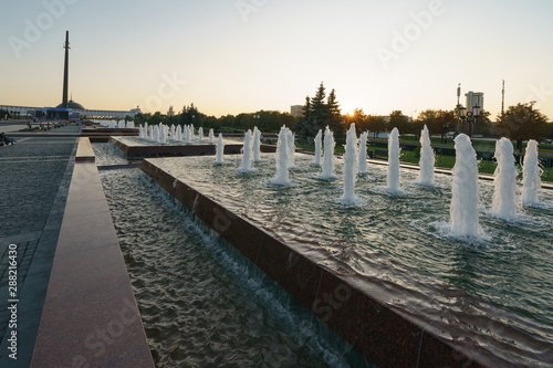 Evening Wide View of Victory Park/Park Pobedy and its fountains on Poklonnaya Hill. The city becomes calm and quiet at sunset. High angle view.