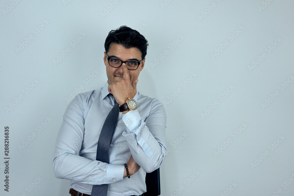 Young handsome businessmanl with glasses