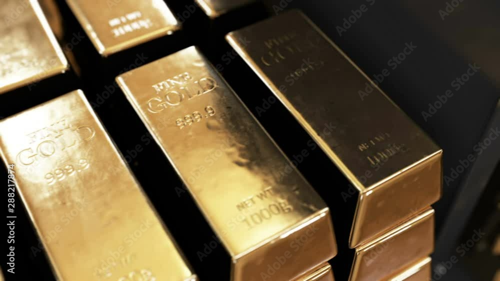 Beautiful Gold Bars on Metal Shelf with Bright Glowing Reflections Seamless. Looped 3d Animation of Golden Bullions in Gold Vault. Banking and Wealth Concept. 4k Ultra HD 3840x2160 Beautiful Gold Bars on Metal Shelf with Bright Glowing Reflections Seamless. Looped 3d Animation of Golden Bullions in Gold Vault. Banking and Wealth Concept. 4k Ultra HD 3840x2160