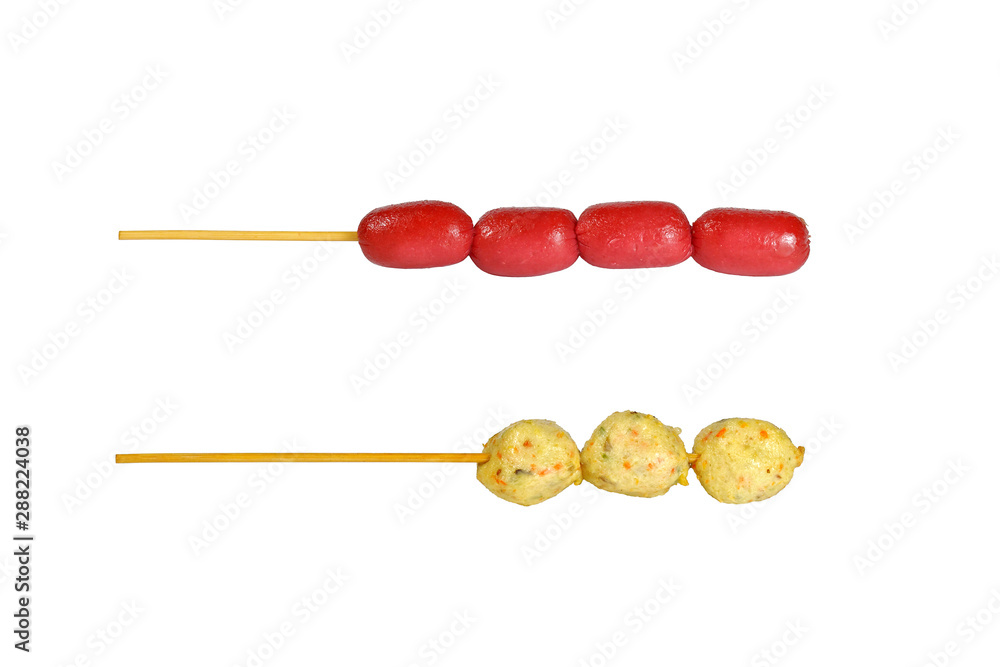 Fried Meatballs and sausage on a stick isolated on white background Fried Meatballs and sausage on a stick isolated on white background