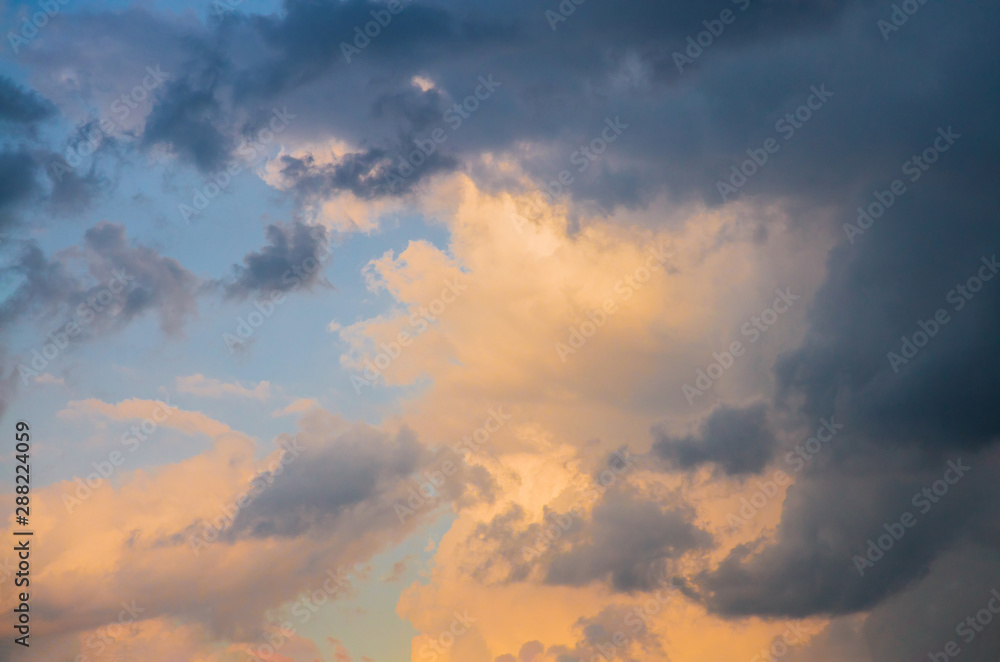 Dramatic sunset sky orange and purple clouds