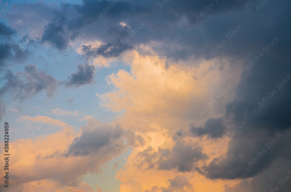 Dramatic sunset sky orange and purple clouds Dramatic sunset sky orange and purple clouds