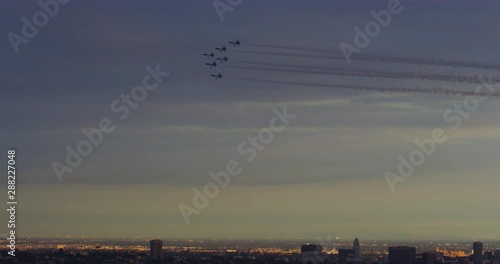 Slow motion of thunderbirds fly over downtown los angeles celebrating upcoming film ‘Captain Marvel’ representing the honor of the men and women serving in the armed forces in Los Angeles, California. 