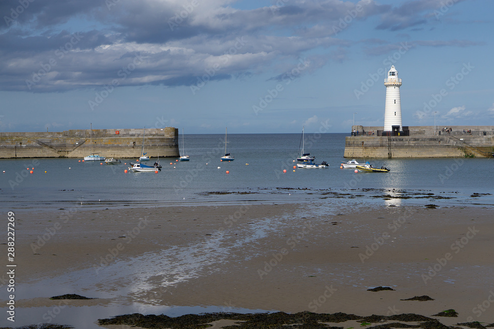 Donaghadee harbour in Northern Ireland at low tide