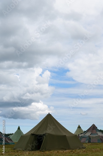 military tent sky and clouds