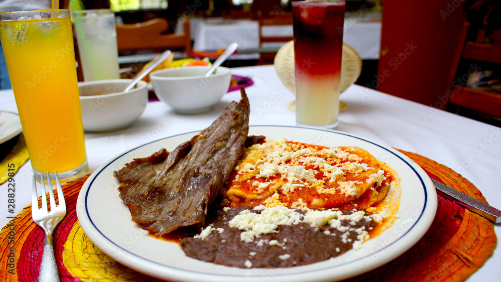 Enchiladas huastecas con cecina, comida mexicana Stock Photo Adobe Stock