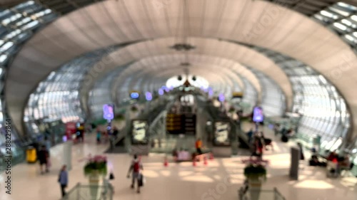 Airport background a interior modern airport with a lot of business people travel in Bali, Indonesia. concept man and woman with luggage, suitcase, advertising