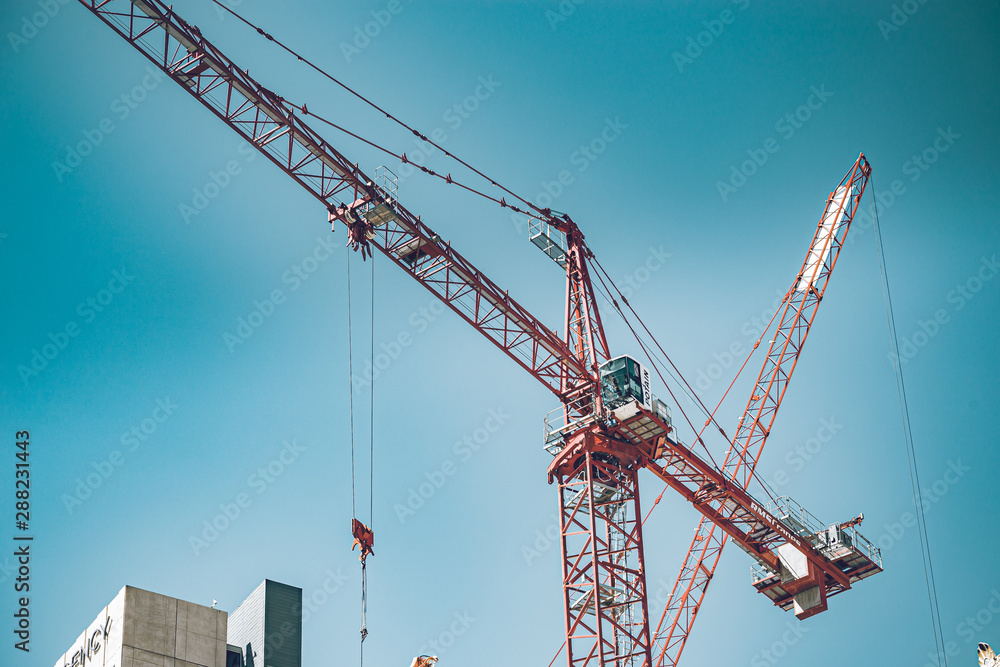 Construction site is happening on the street of downtown. Busy district. Construction site is happening on the street of downtown. Busy district.
