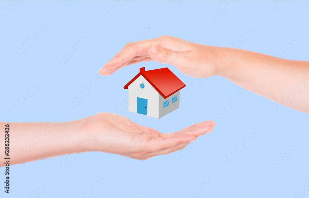 two hands protecting house two hands protecting house