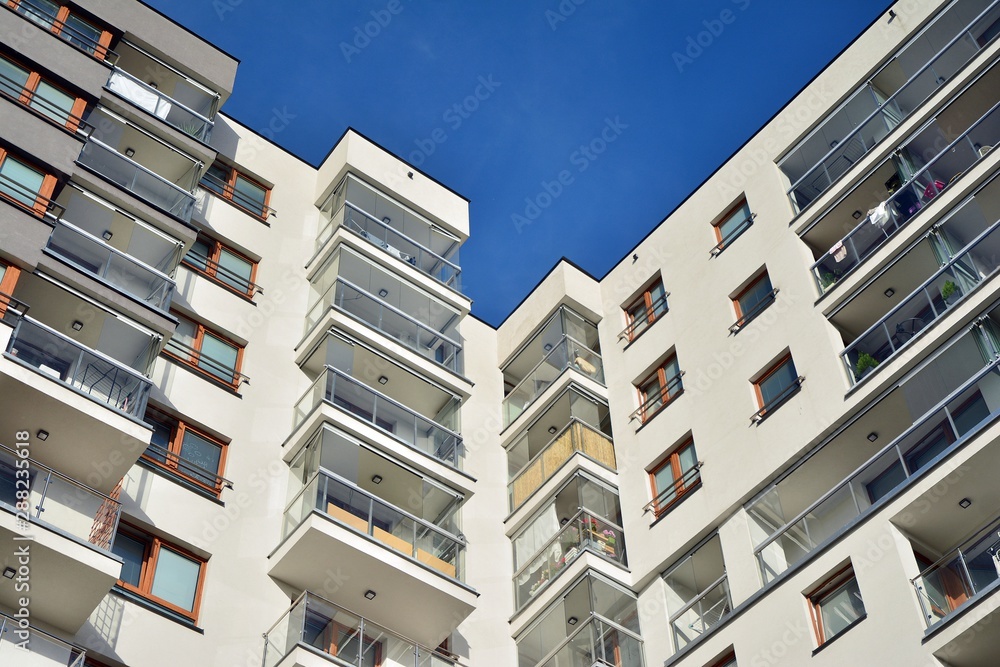 Modern European residential apartment buildings quarter. Abstract architecture, fragment of modern urban geometry.