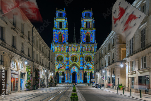 Joanna of Arc street that flows into the Church of the Holy Cross in Orleans, France. Illuminated with the technique called maping