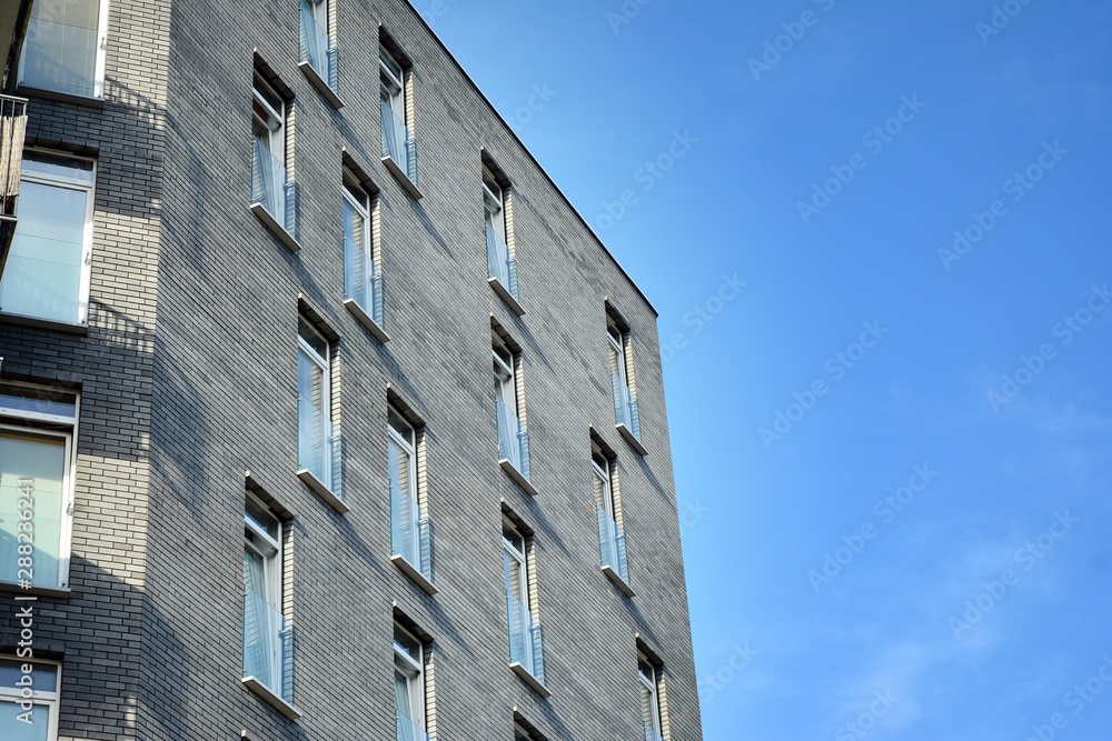 Modern European residential apartment buildings quarter. Abstract architecture, fragment of modern urban geometry.