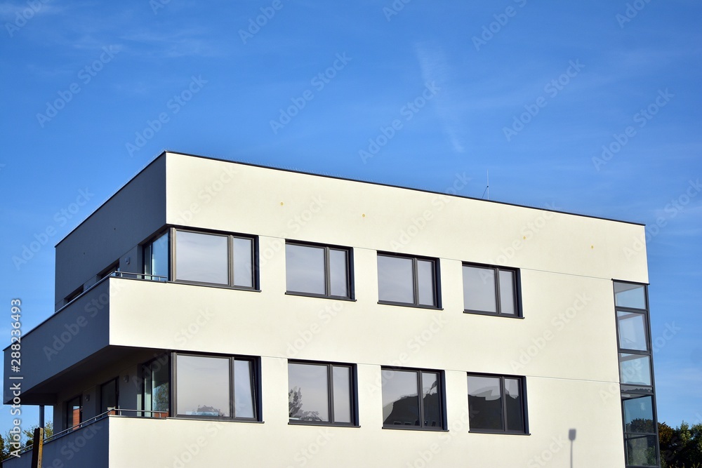 The windows of a modern building for offices. Business buildings architecture.