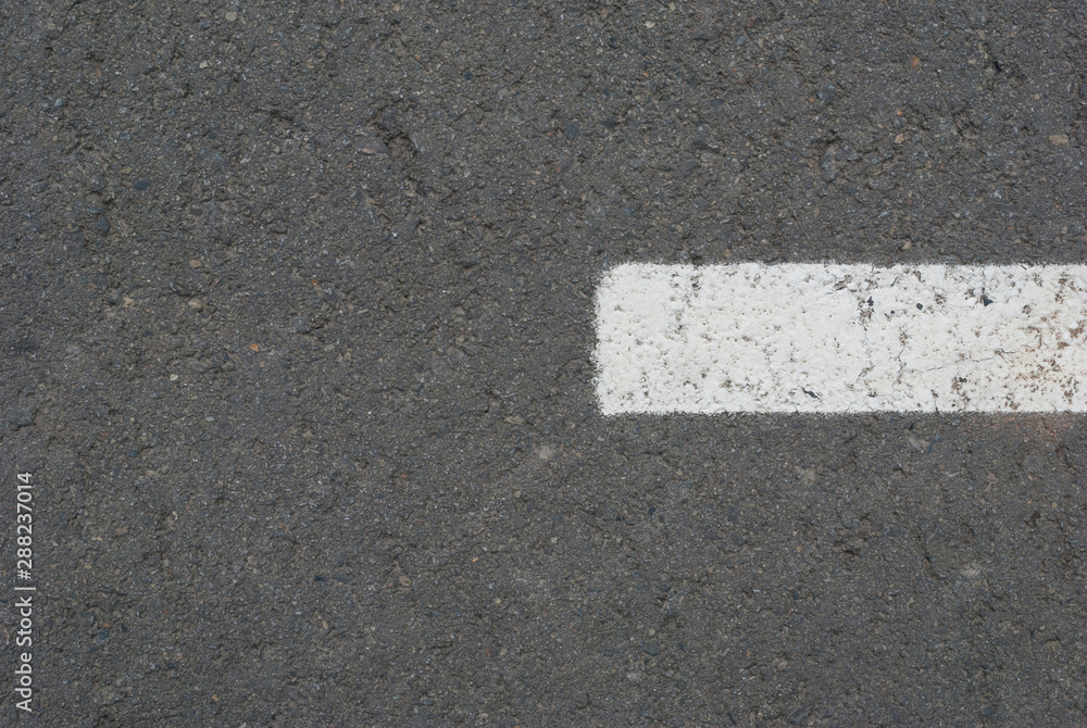 Fototapeta premium New asphalt texture with white dashed line