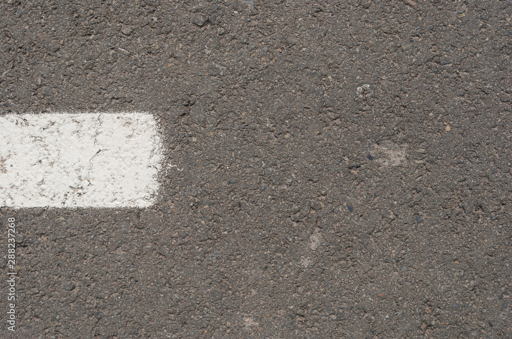Fototapeta premium New asphalt texture with white dashed line