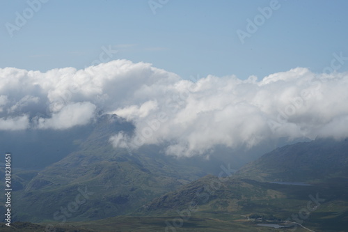 Mountain Range Covered in Clouds © Michael