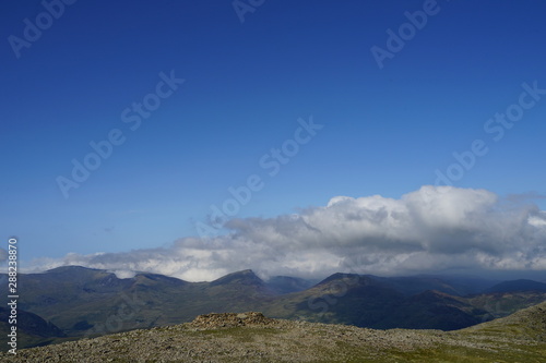 Fototapeta Naklejka Na Ścianę i Meble -  Mountain Range Covered in Clouds