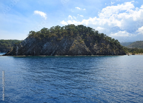 View of the islands near Marmaris. Sandy beaches, mountain landscapes. This is the largest resort of the Aegean coast of Turkey.