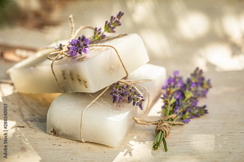 Natural and moisture lavender soap in summer garden Natural and moisture lavender soap in summer garden