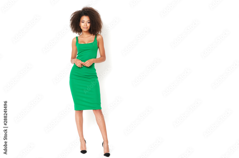 Afro american girl in tiny green dress looks gorgeous. Afro american girl in tiny green dress looks gorgeous.