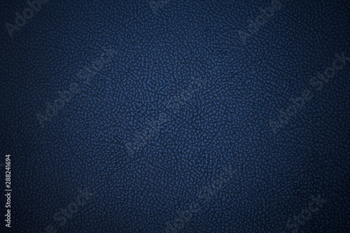 Old blue dermantine. Artificial dark skin. Close-up. Background. Texture.