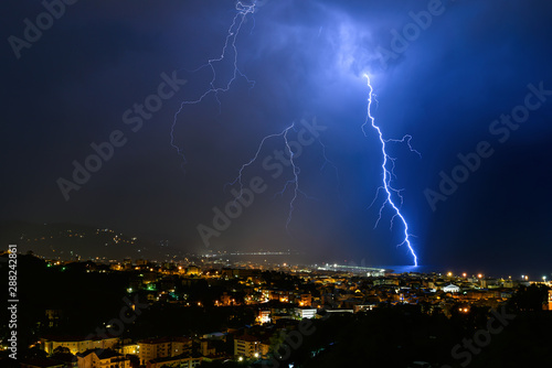 Lightning and thunderstorm on the Tigullio Gulf - Ligurian sea - Chiavari - Italy.