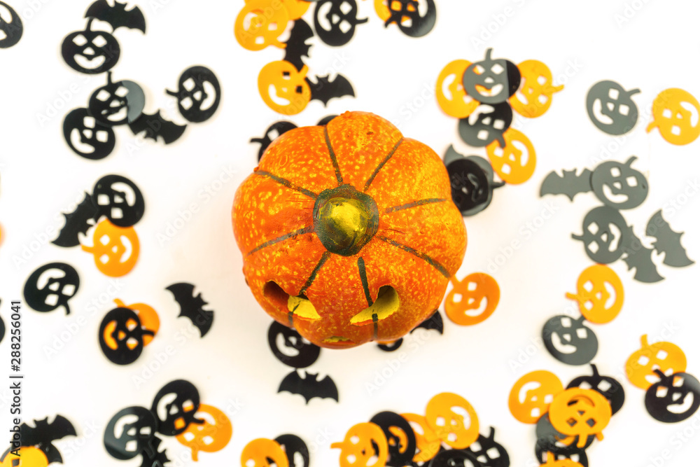 Obraz premium Halloween decoration concept, little jack-o-lantern pumpkins overhead isolated