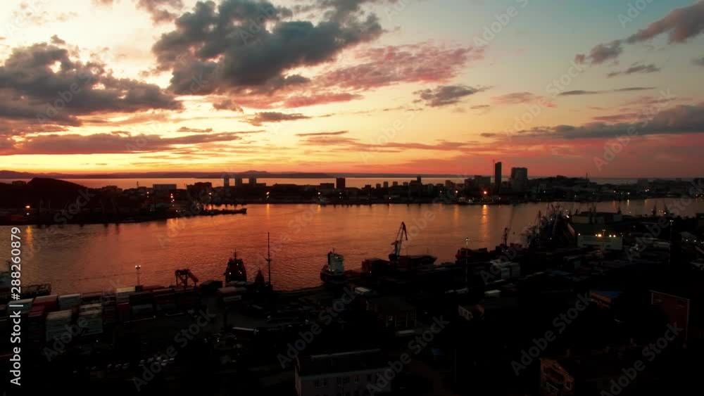 Aerial view of the cityscape overlooking the Bay and sunset. Aerial view of the cityscape overlooking the Bay and sunset.