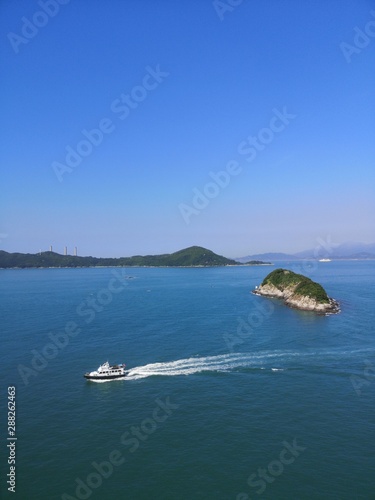 Fototapeta Naklejka Na Ścianę i Meble -  Overlook Lamma Island, Magazine Island and Lung Shan Pai from South Horizons, Apleichau, Hong Kong