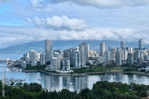 Vancouver skyline on a summer day. False Creek  Vanier Park  Burrard Bridge  Yaletown  West End and Seawall from above.  Vancouver Downtown  British Columbia. Canada.