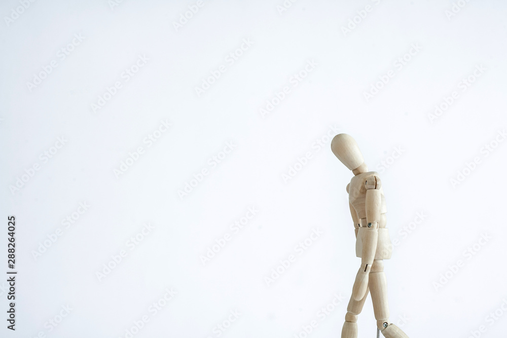 wooden mannequin with hand on head isolated on white wooden mannequin with hand on head isolated on white