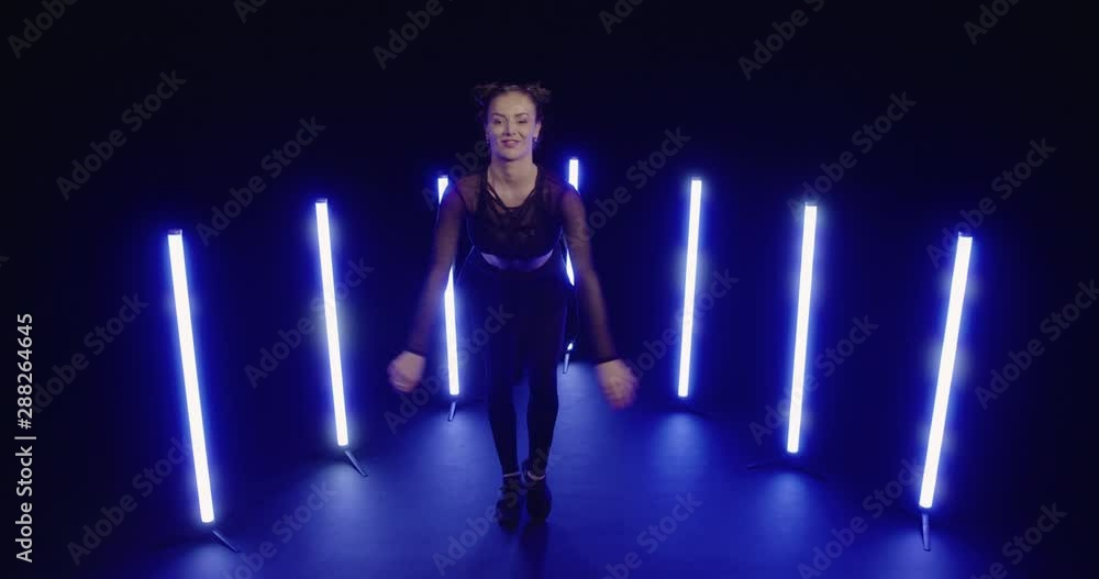Studio, slow motion, female modern dancer showing off moves, London Studio, slow motion, female modern dancer showing off moves, London