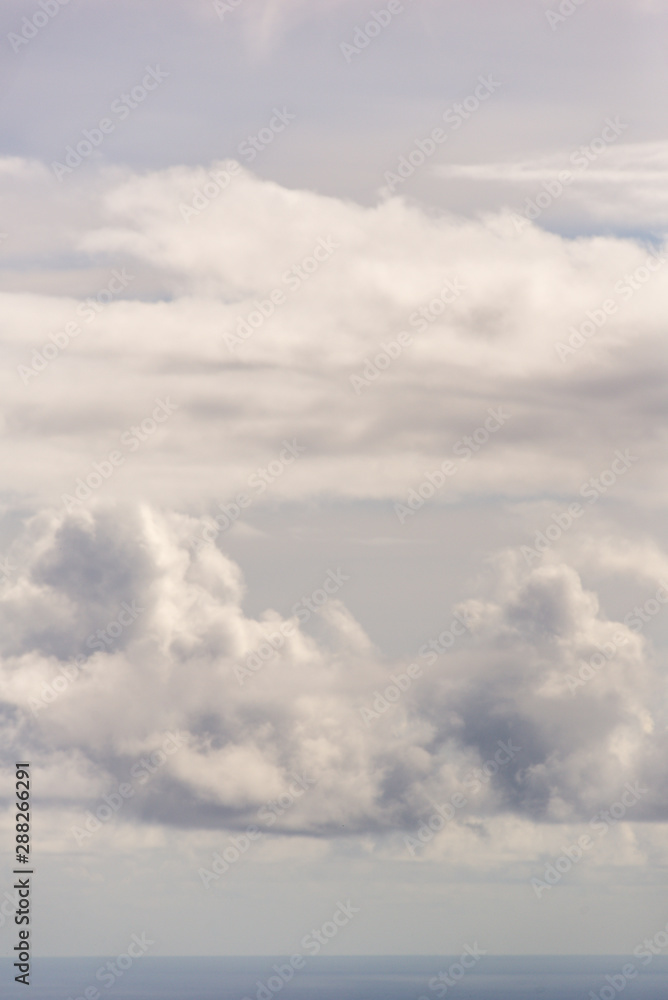 clouds above ocean clouds above ocean