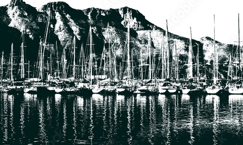 Landscape with sail boats in Hout Bay habour photo