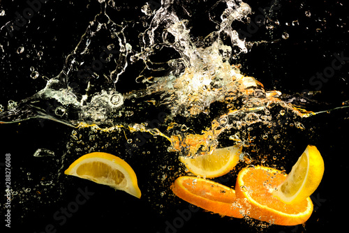 orange in water splash