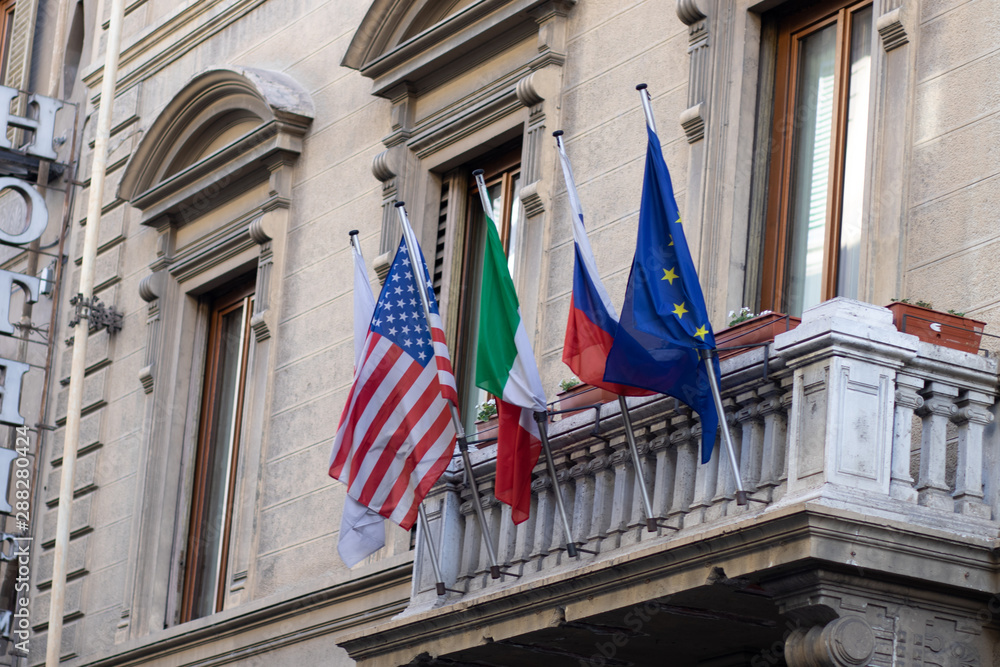 Fototapeta premium flags in front of building