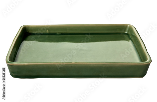 Empty rectangular plate, Green ceramics plate, isolated on white background with clipping path, Side view 
