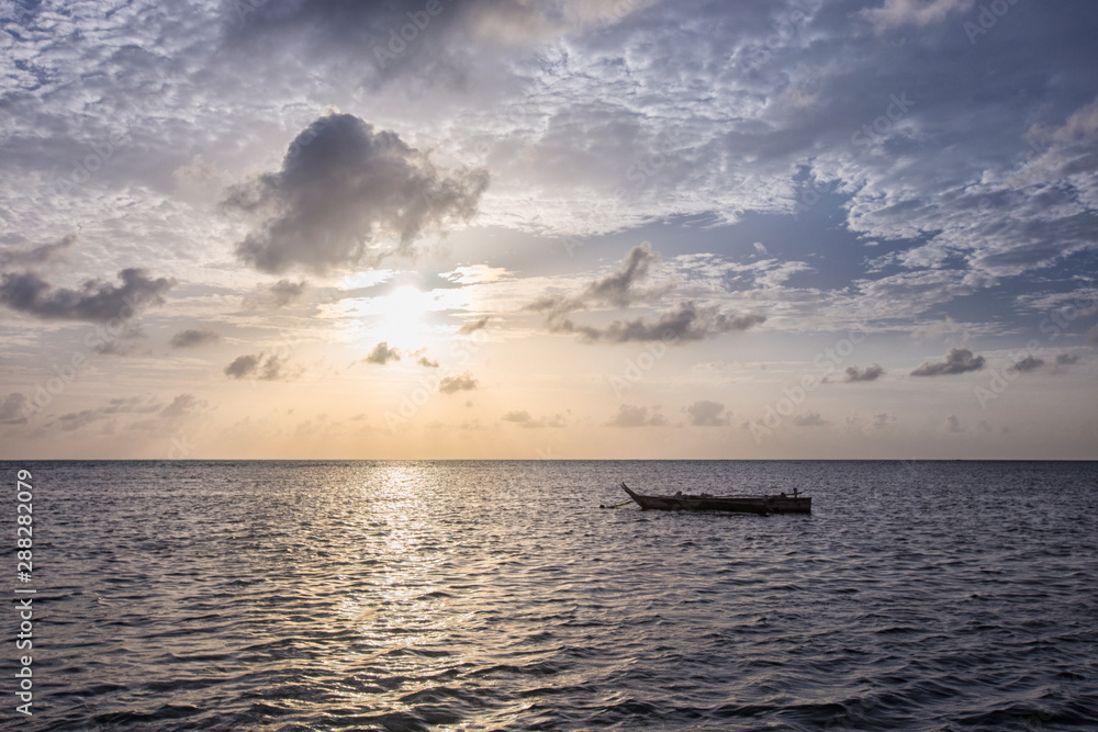Boat of a fisherman on a tropical beach, Zanzibar, Tanzania