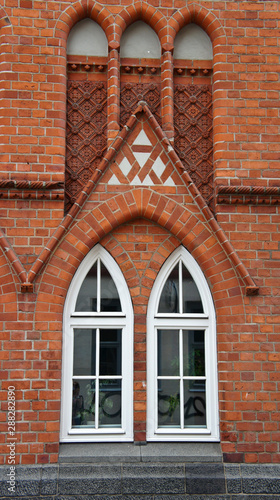 Detail of brick building, decoration windows, Lubeck, Germany