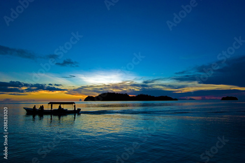 Kadidiri Sunset, Togian Islands Indonesia photo